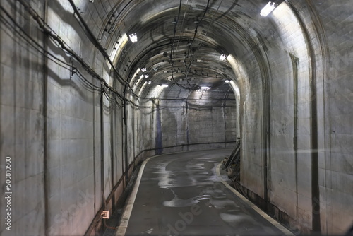Toyama,Japan - April 23, 2022: Interior of Tateyama Tunnel, a part of Tateyama Kurobe Alpine Route Japan  © Khun Ta