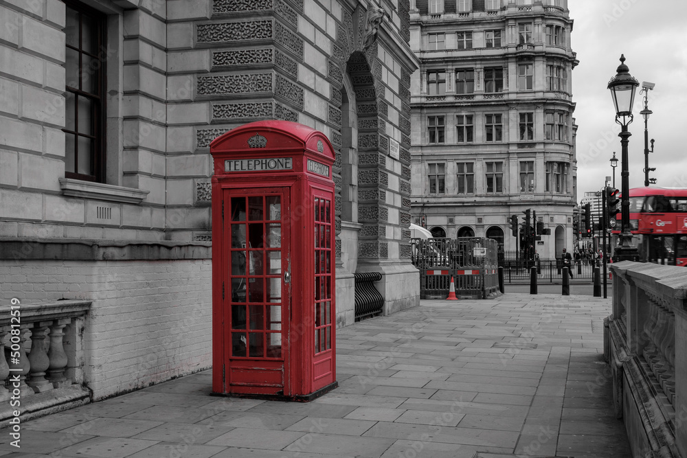 Classic British view: Red phone booth in London, UK Classic British view: Red phone booth in London, UK