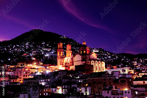 Magical town illuminated by warm lights and clear skies, Taxco, Guerrero, Mexico photo