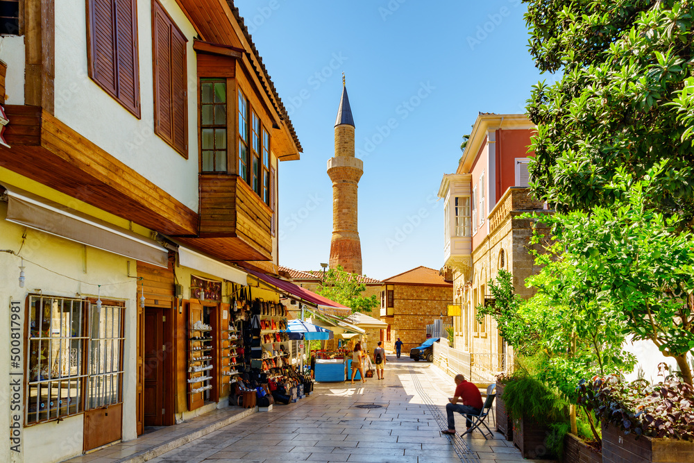 Obraz premium The Kesik Minare and an old street in Kaleici, Antalya