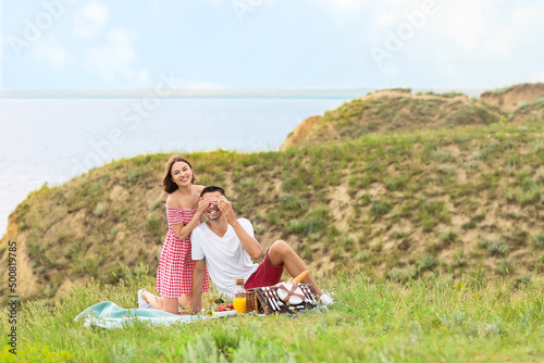 Happy young couple having r...