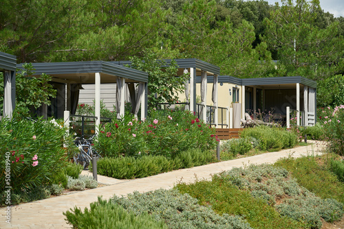 Fototapeta Naklejka Na Ścianę i Meble -  Bungalows on a hiking trail on the Adriatic Sea near the town of Krk in Croatia