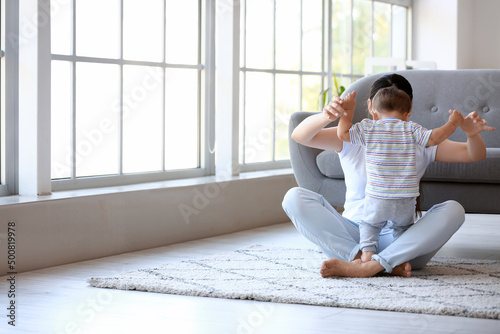 Little baby boy learning to...
