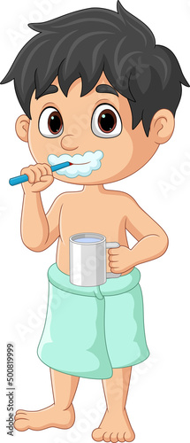 Cute little boy brushing teeth