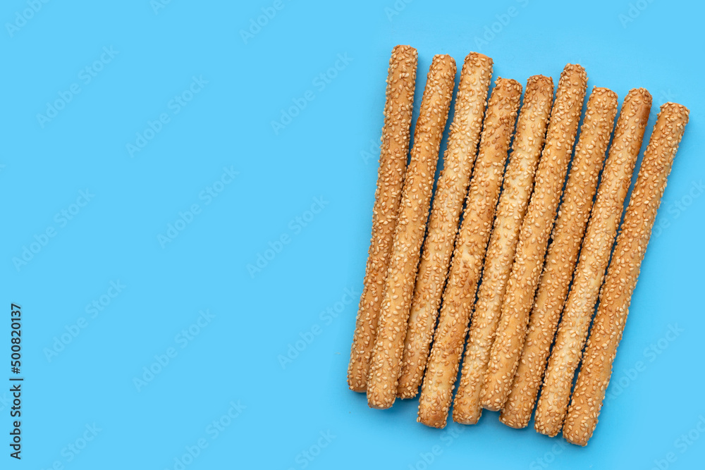 Bread sticks on blue background Bread sticks on blue background