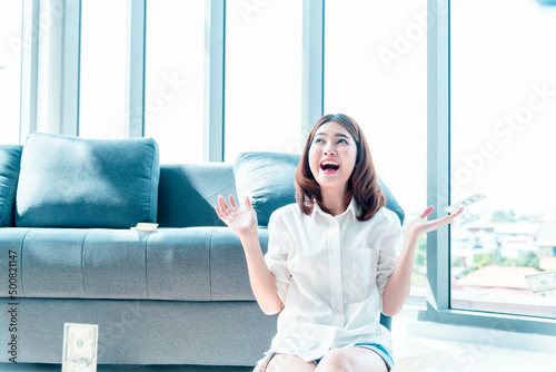 Happy young asian woman holding dollar money and throw in the air celebrate happiness dance wealth lottery money rain drop. Winner Success business woman throw cash flow Happy money smiling face Free Download Happy young asian woman holding dollar money and throw in the air celebrate happiness dance wealth lottery money rain drop. Winner Success business woman throw cash flow Happy money smiling face - GFXLoad