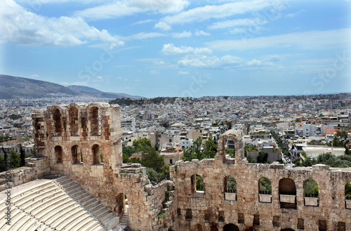 Odeon of Herodes Atticus Theater at Acropolis behind Athens City in Greece. The building was completed in AD 161 and then renovated in 1950. 