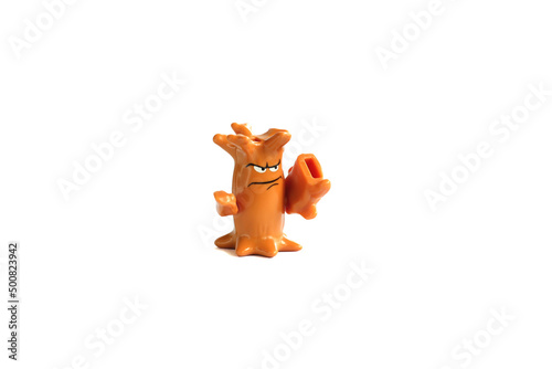 Close-Up Of Children's toy brown tree knight On White Background.
