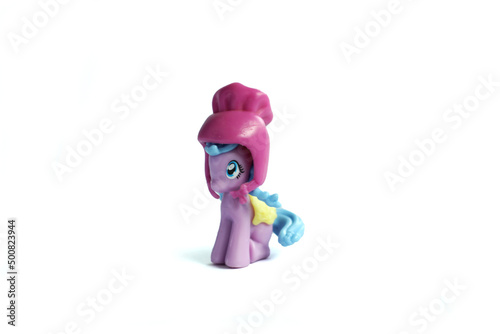 plastic toy horse isolated on white