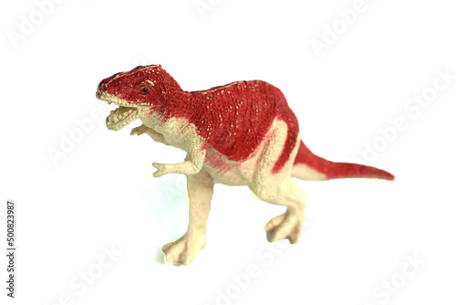 Carnotaurus rubber toy dinosaur isolated on white background © arif saifuloh