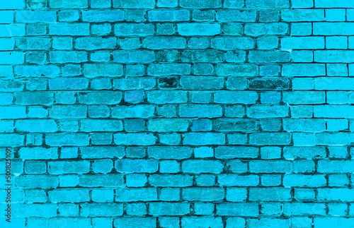 Cool blue textured brick background. Rough vintage architecture texture.
