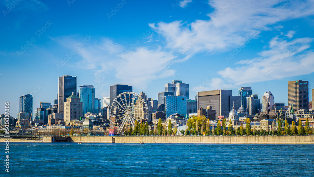 Fototapeta premium View on Montreal skyline, with Mount Royal in the background from the Jacques Cartier bridge, on a clear fall day