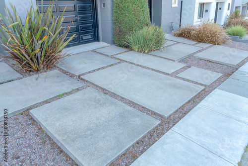 Staggered concrete pavers outside the house at San Francisco, California photo