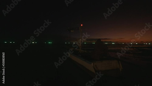 Thunder and fisihng boat during sunset - Timelapse photo