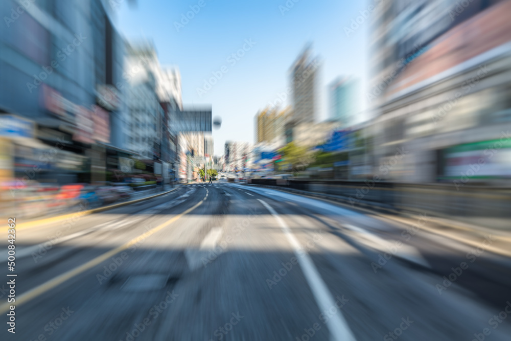 Blurred urban traffic in city.