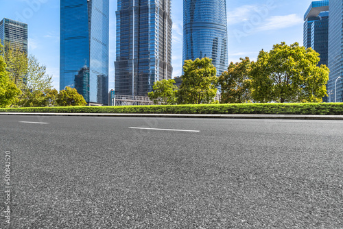 Fotografiet empty asphalt road with shanghai city skyline background in china