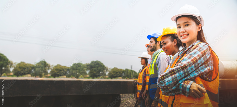 Railway engineer team are standing and looking forward confidently in a successful job, teamwork concept, Image panorama use for banner cover design.