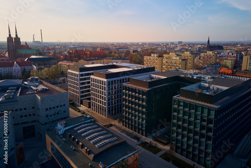 Modern residential area in europe city. Office buildings aerial view. Cityscape of Wroclaw neighborhood, Poland