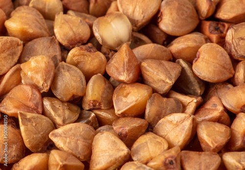 Close-up of buckwheat groats as background.