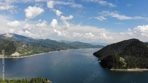 Wallpaper Mural Aerial footage over a reservoir in the afternoon.  Reservoir stretches for miles in the distance.  Forest covered mountains surround the reservoir. Torontodigital.ca