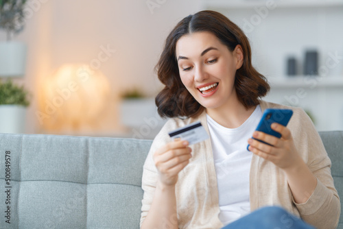 Woman is doing online purchases