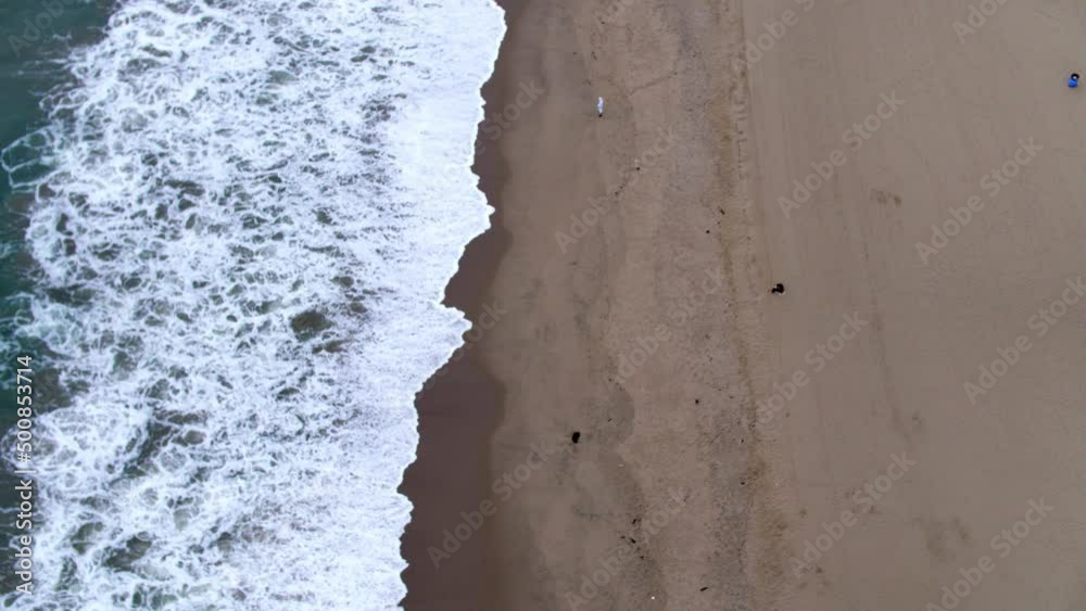 Aerial Top Upward Beautiful Shot Of Seashore At Wet Beach - Santa Monica, California Aerial Top Upward Beautiful Shot Of Seashore At Wet Beach - Santa Monica, California