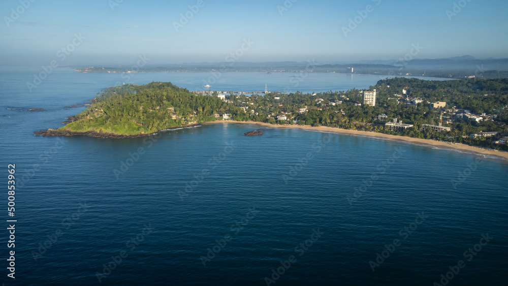 Mirissa, Sri Lanka. Tourist city, top view. Main beach, view from the ocean