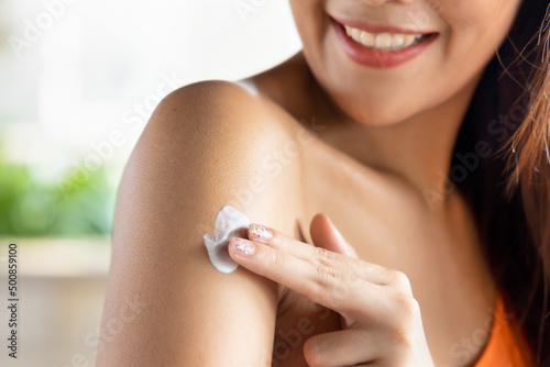 Summer woman applying sun cream, concept image of skin care, self care, spa on holiday vacation