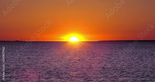 Timelapse of beautiful sunset over the Baltic Sea in Tallinn, Estonia. 4K high quality