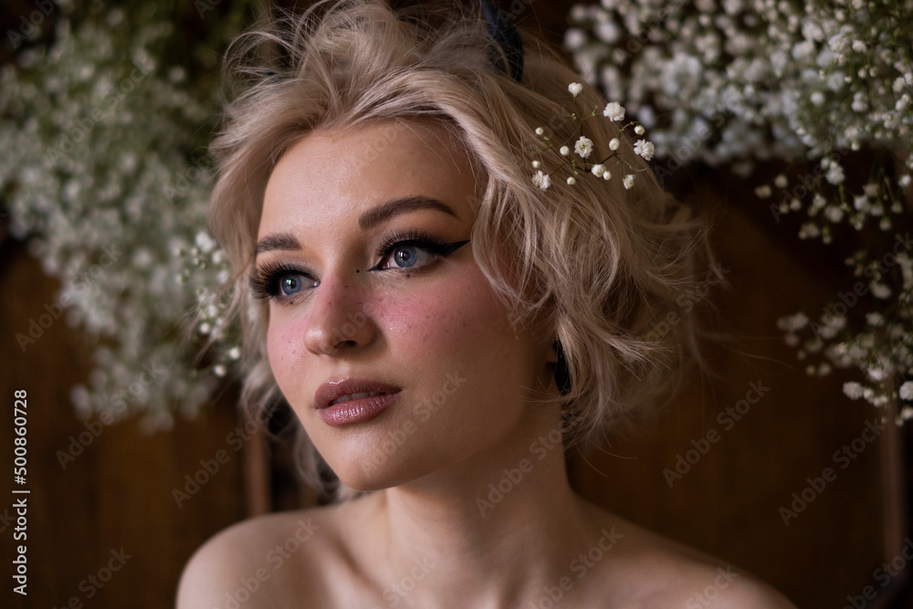 Young woman with blond hair and make-up Young woman with blond hair and make-up