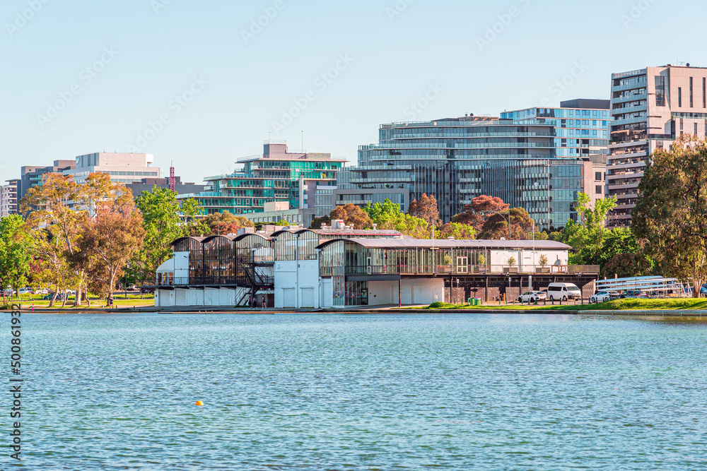 Cityscape of buildings, park and river.