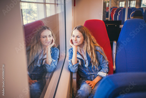 Woman traveling by pablic transport photo