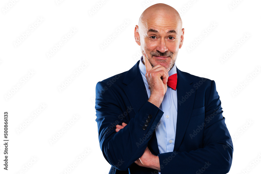 Studio portrait of middle aged man wearing suit and bow tie while standing at isolated white background Studio portrait of middle aged man wearing suit and bow tie while standing at isolated white background