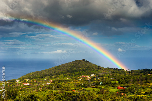 A rainbow over the "Montaña de la Breña" mountain, in Breña Baja town (La Palma. Canary Islands. Spain).