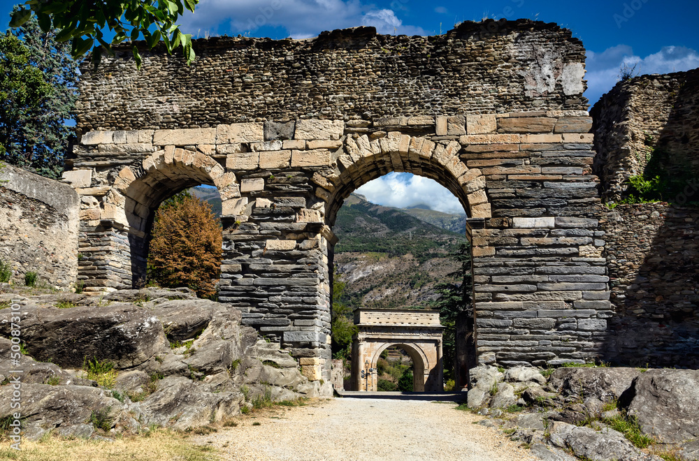Ruins of ancient roman aqueduct in Susa, Italy