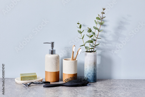 Fotobehang mage of personal toiletries for hygiene and beauty on ceramic table in bathroom