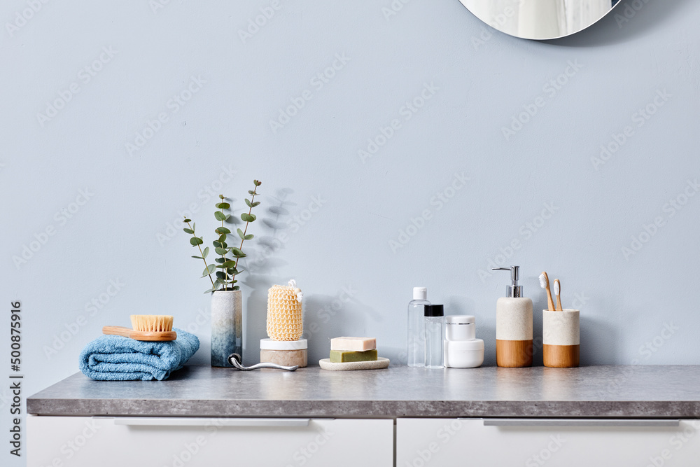 Female toilet table in bathroom with toiletries for hygiene and body care Female toilet table in bathroom with toiletries for hygiene and body care
