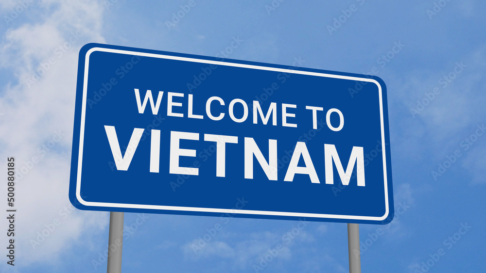 Welcome to Vietnam Road Sign on Clear Blue Sky Welcome to Vietnam Road Sign on Clear Blue Sky