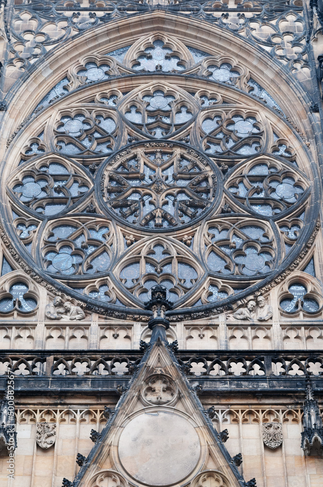 View of gothic rose window of St. Vitus Cathedral in Prague, Czech Republic, viewed from below