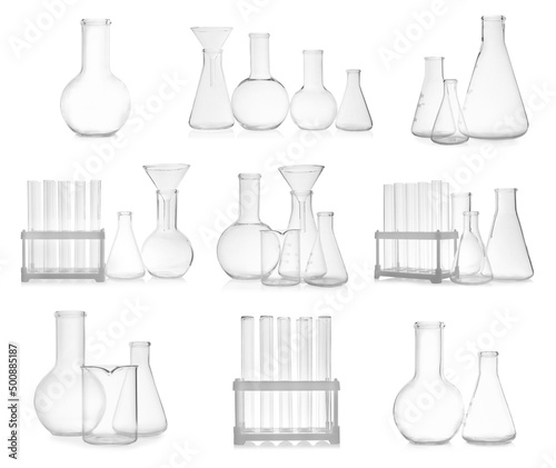 Set of different empty laboratory glassware on white background