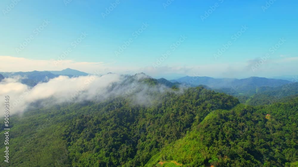 4K aerial view from a drone flying over the valley, fog in the morning. bright weather and amazing nature landscape. Khao sok National Park, Surat Thani, Thailand. 4K
4K aerial view from a drone flying over the valley, fog in the morning. bright weather and amazing nature landscape. Khao sok National Park, Surat Thani, Thailand. 4K