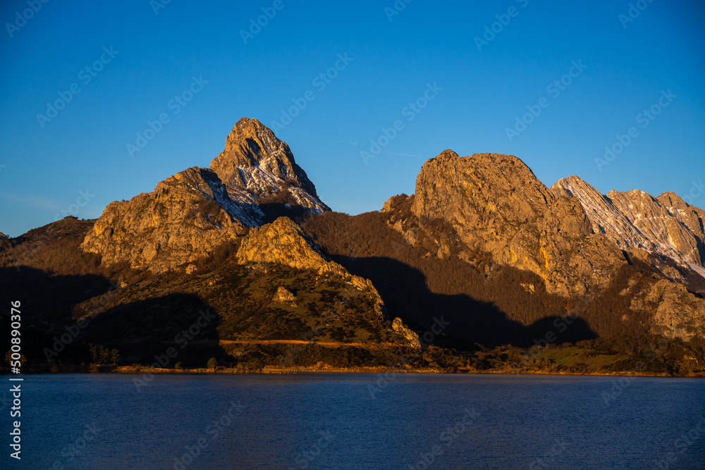 Sunrise over mountains at Riaño reservoir in Spain