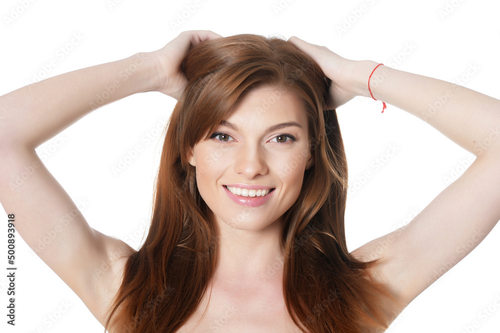 Close-up portrait of beautiful young woman with perfect skin on white background Close-up portrait of beautiful young woman with perfect skin on white background