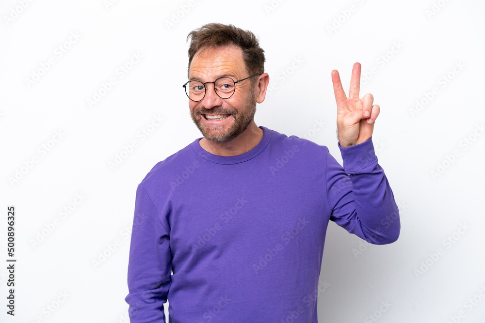 Middle age caucasian man isolated on white background smiling and showing victory sign Middle age caucasian man isolated on white background smiling and showing victory sign