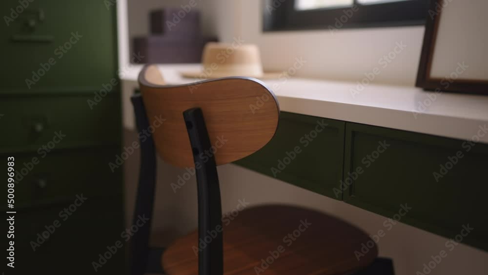 dolly shot of working at home corner design wooden cosy chair woth white desk next to big window and sun soft light day time