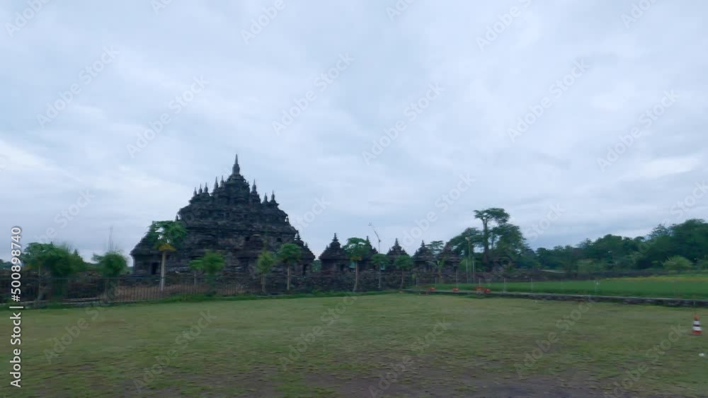 Plaosan Buddha temple landscape view in panning camera movement. A tourist destination in Central Java, Indonesia Plaosan Buddha temple landscape view in panning camera movement. A tourist destination in Central Java, Indonesia