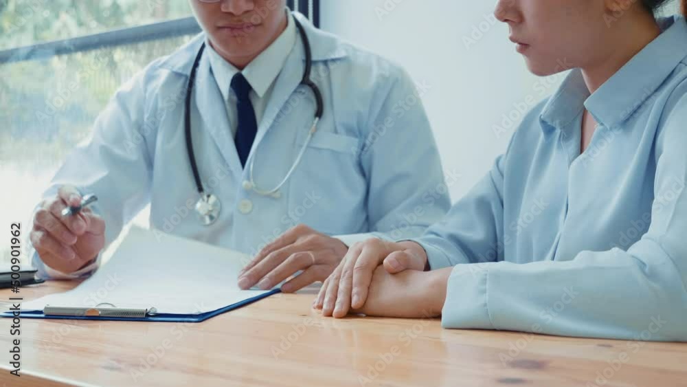 Doctors and patients sit and talk. At the table near the window in the hospital. Doctors and patients sit and talk. At the table near the window in the hospital.
