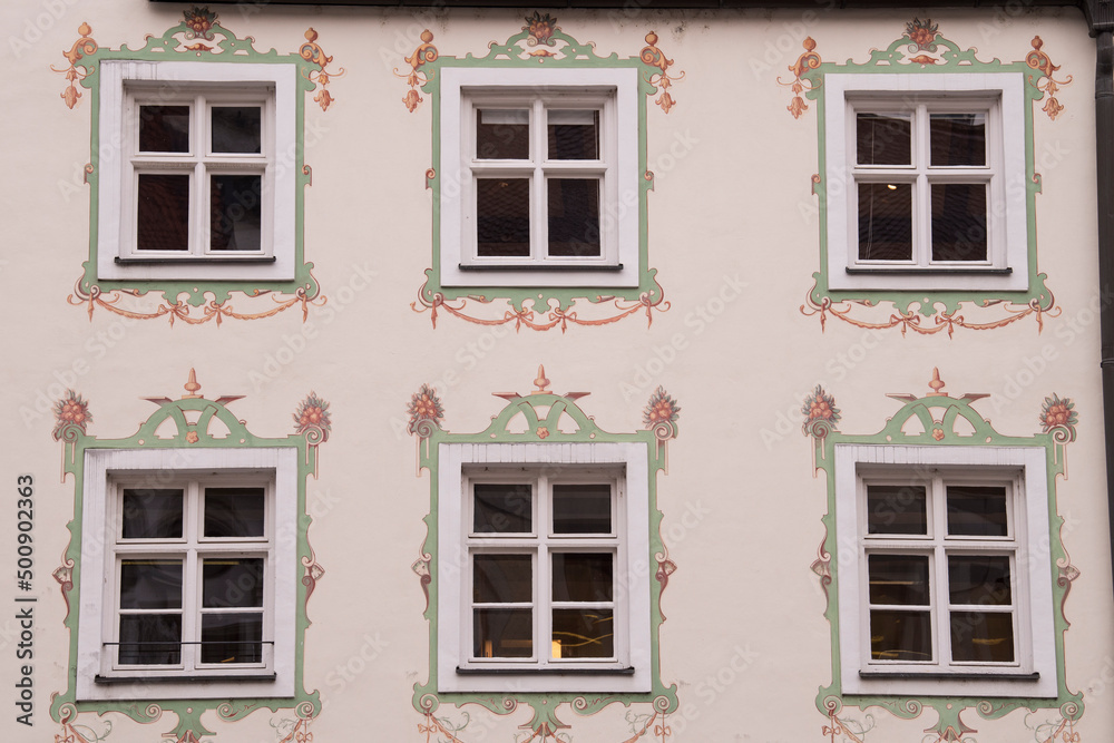 Fototapeta premium Munich, Germany - December 19 2021: Street view of the facade of the building in Munich downtown on Winter day.
