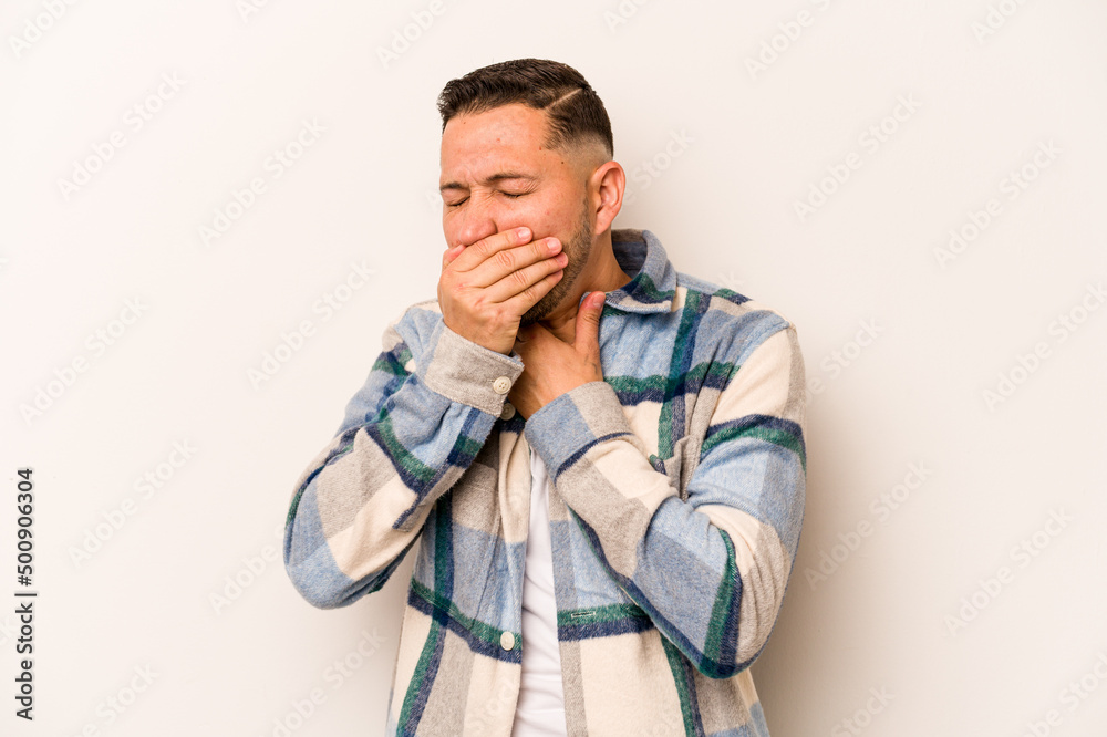 Young hispanic man isolated on white background suffers pain in throat due a virus or infection. Young hispanic man isolated on white background suffers pain in throat due a virus or infection.
