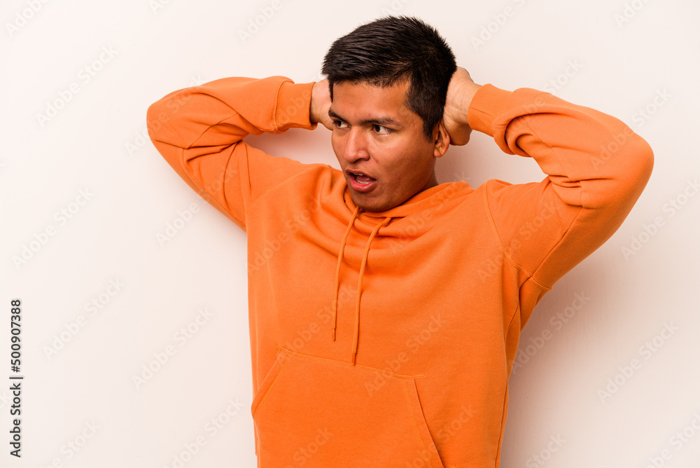 Young hispanic man isolated on white background screaming, very excited, passionate, satisfied with something. Young hispanic man isolated on white background screaming, very excited, passionate, satisfied with something.